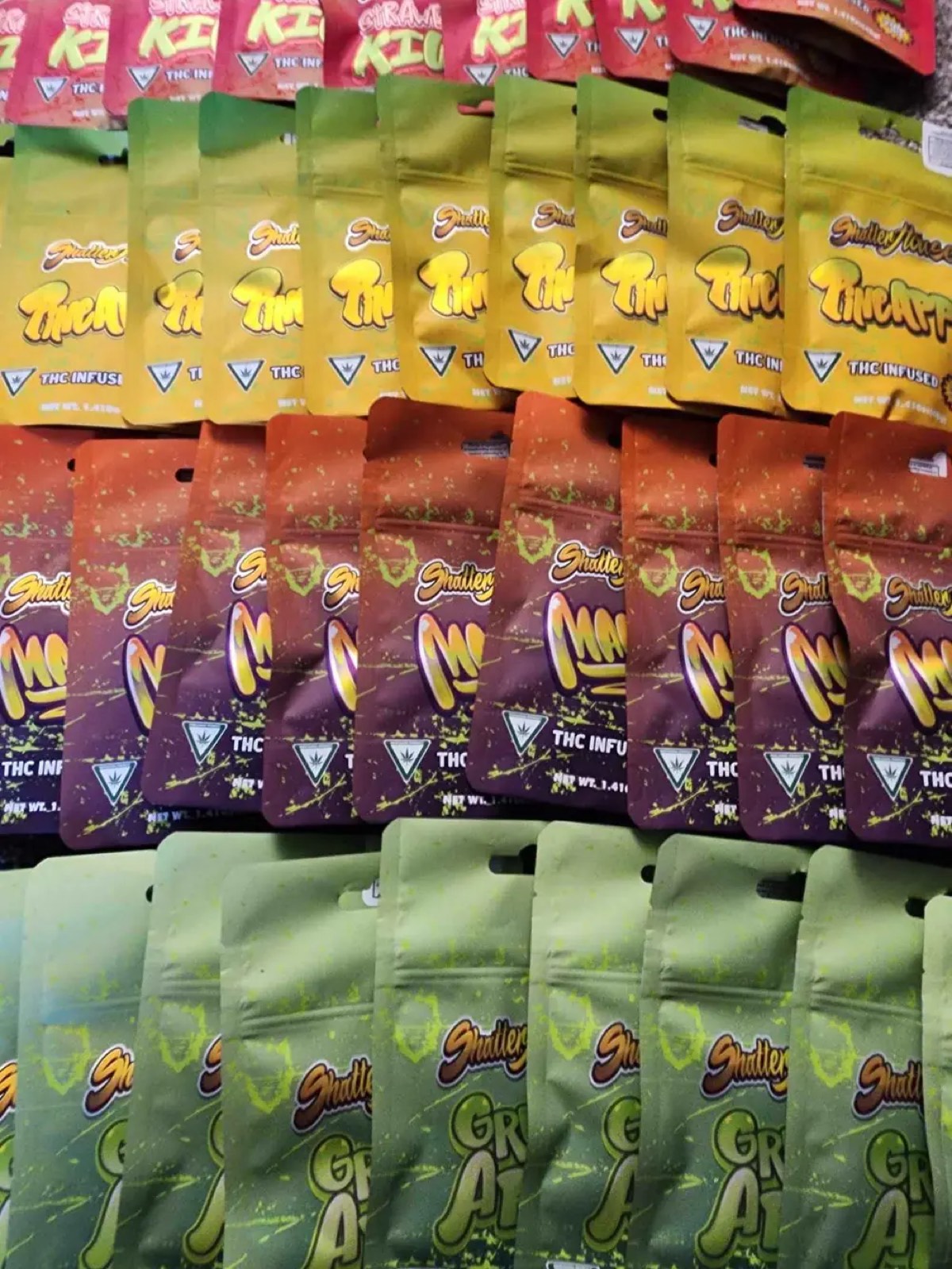 Retail shelf of packaged cannabis edibles